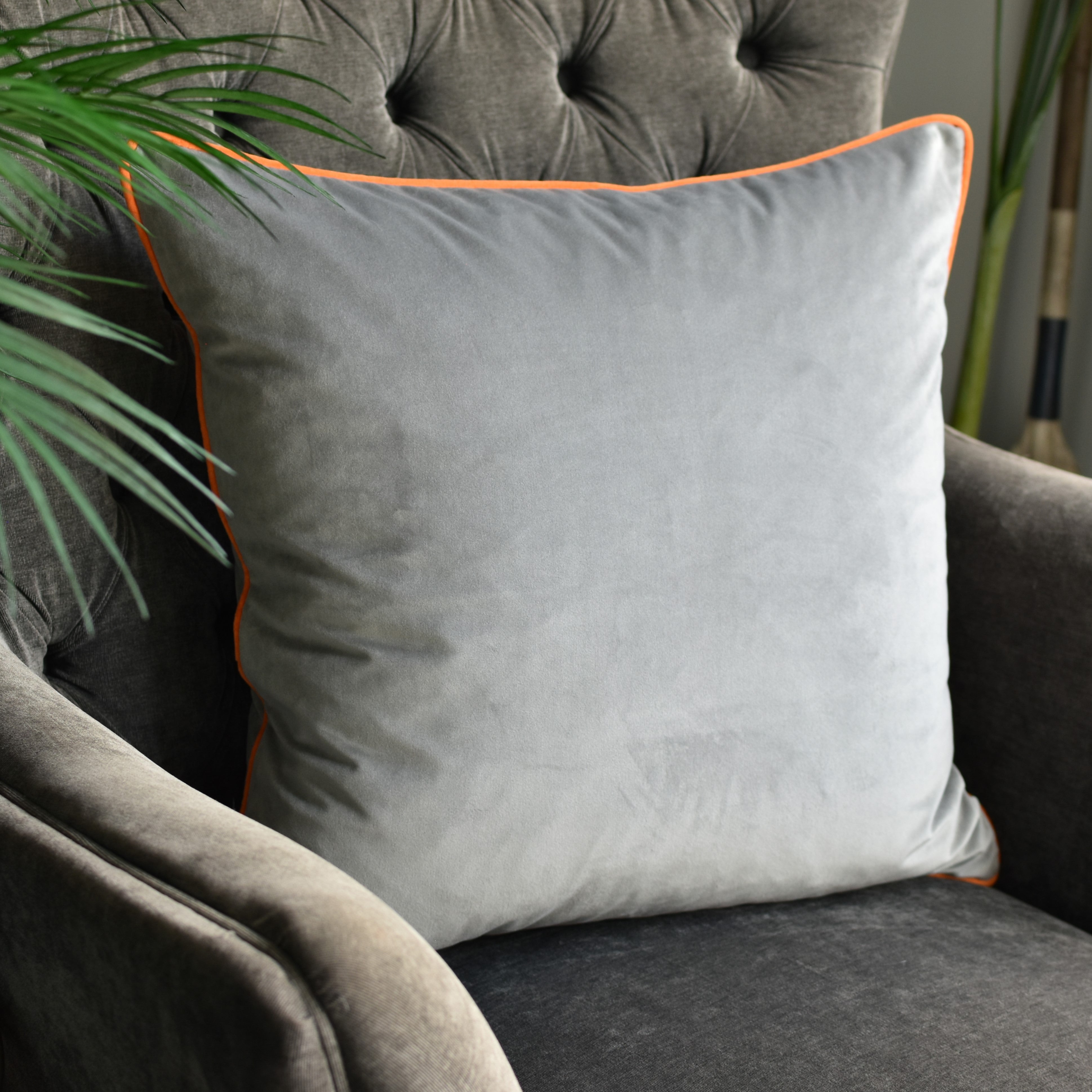 Grey and orange store cushion